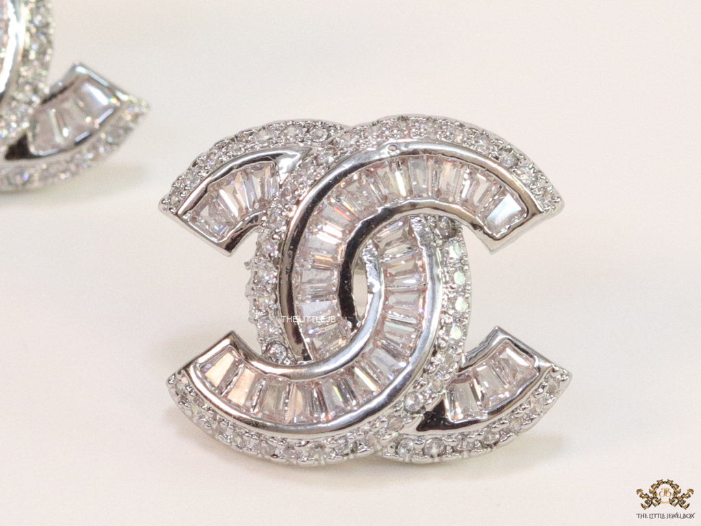 Platinum plated twin C motif cz baguette studs