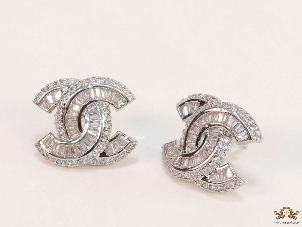 Platinum plated twin C motif cz baguette studs