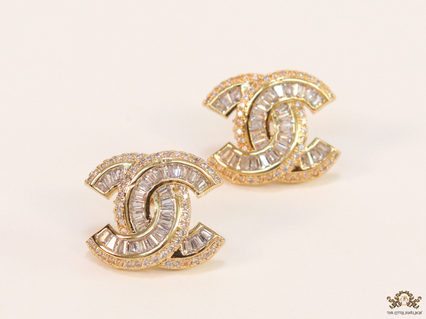Gold plated twin C motif cz baguette studs