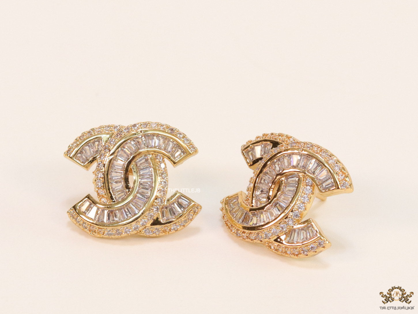 Gold plated twin C motif cz baguette studs