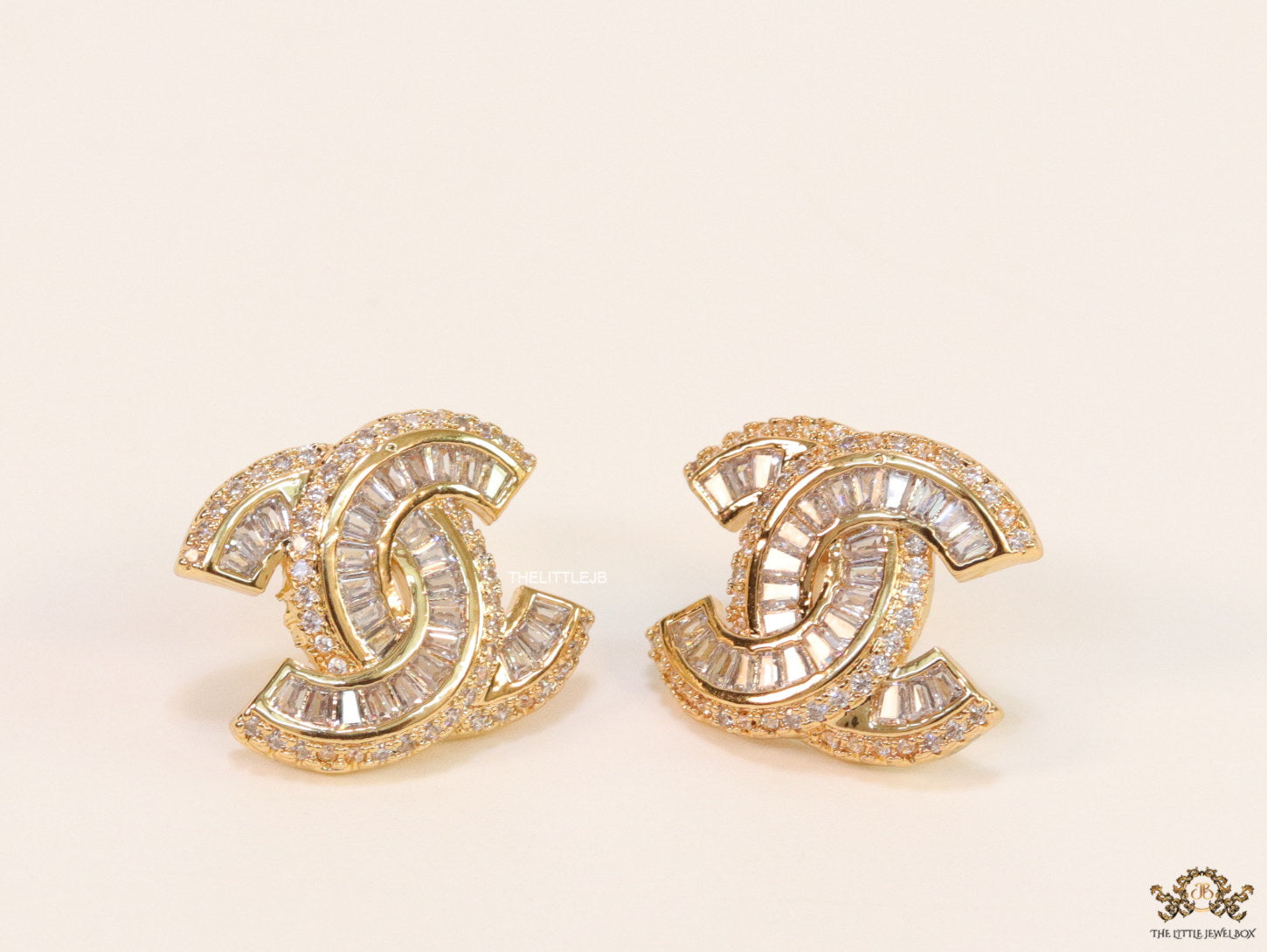 Gold plated twin C motif cz baguette studs