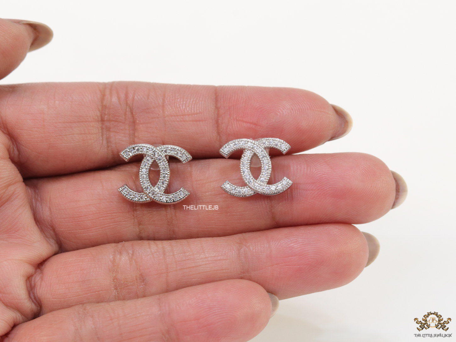 Platinum plated twin C motif cz studs