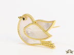 Gold plated white bird brooch