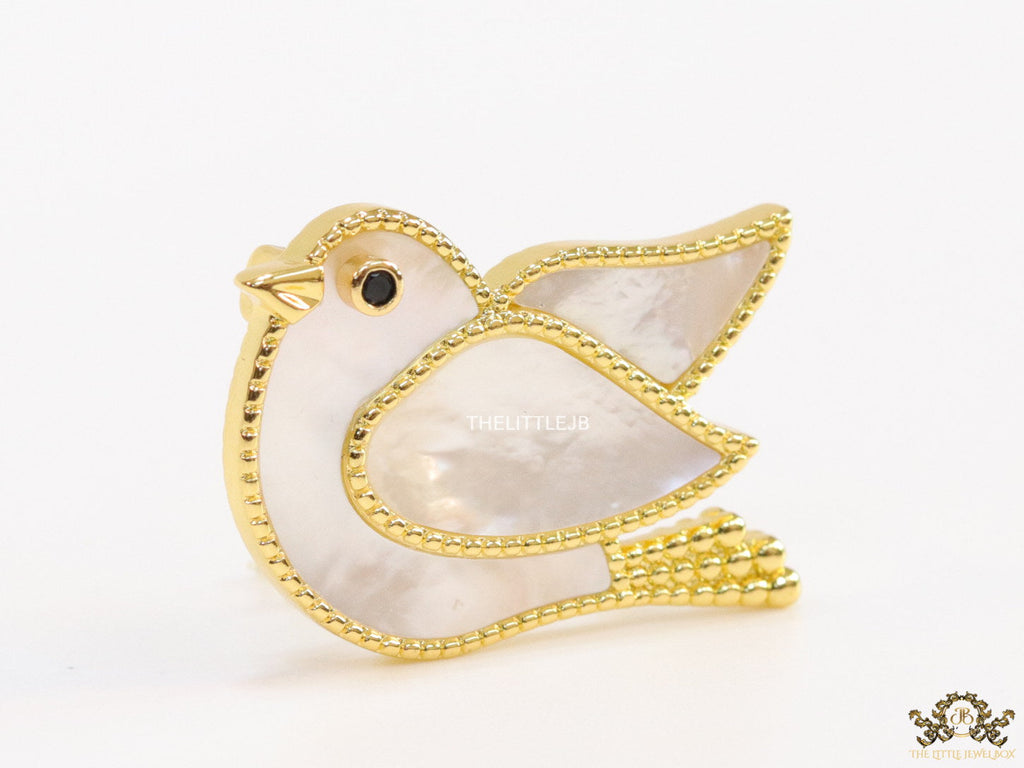 Gold plated white bird brooch