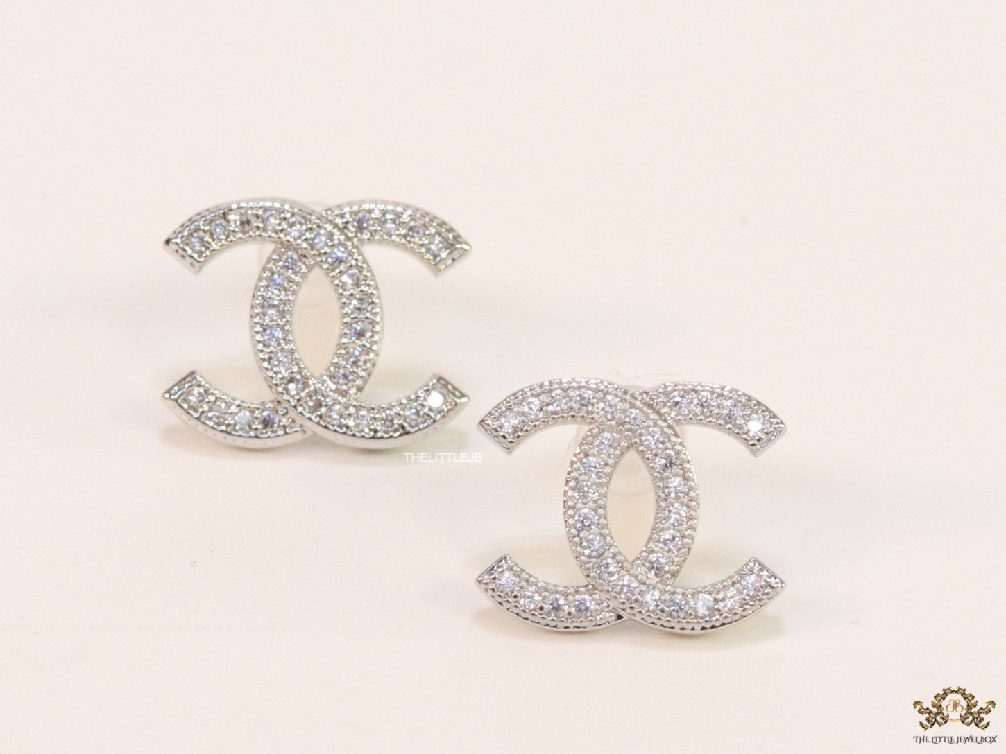 Platinum plated twin C motif cz studs