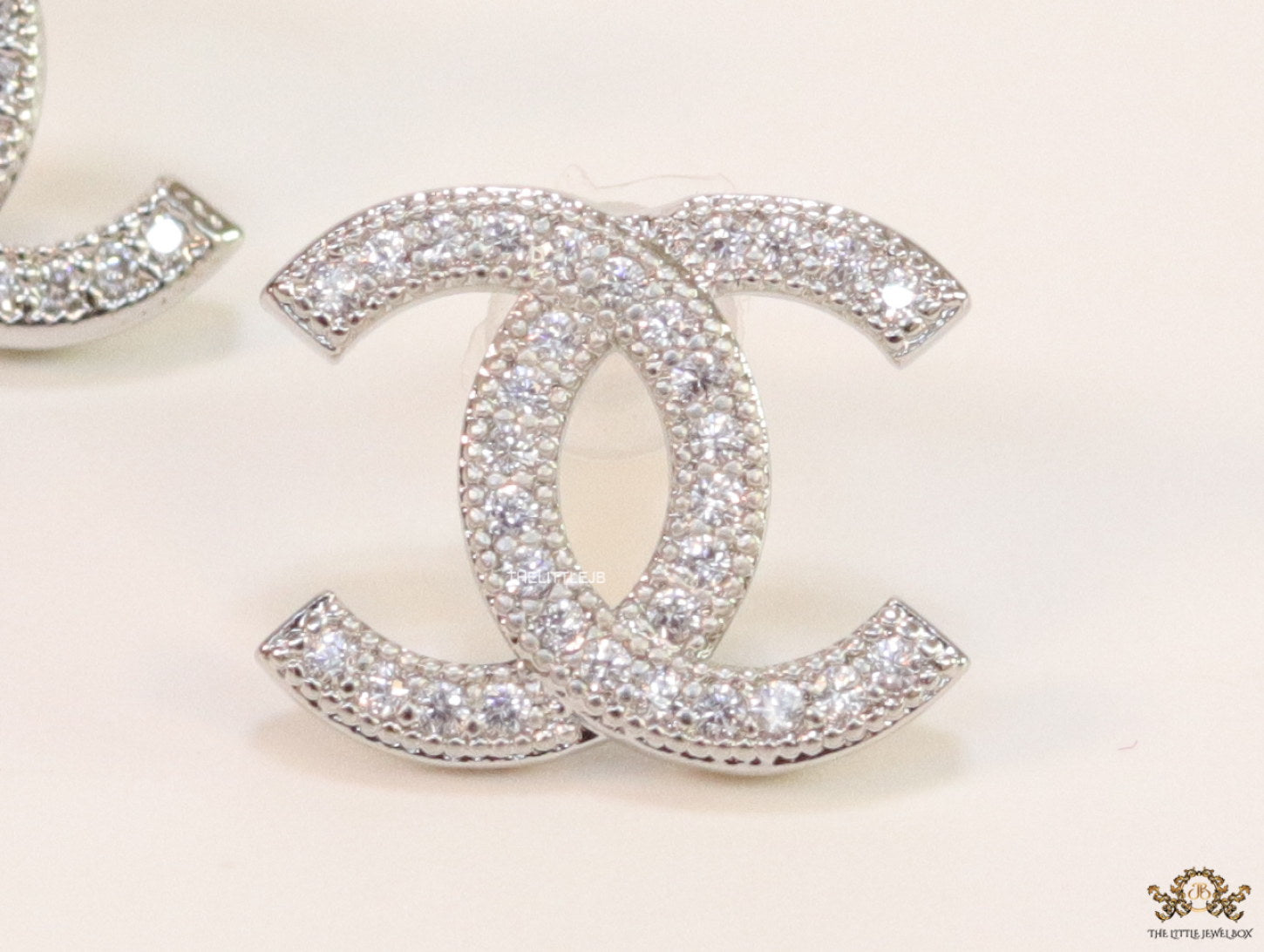 Platinum plated twin C motif cz studs