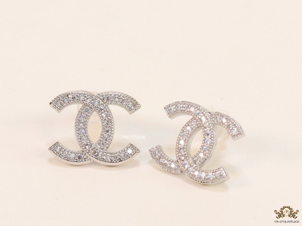 Platinum plated twin C motif cz studs