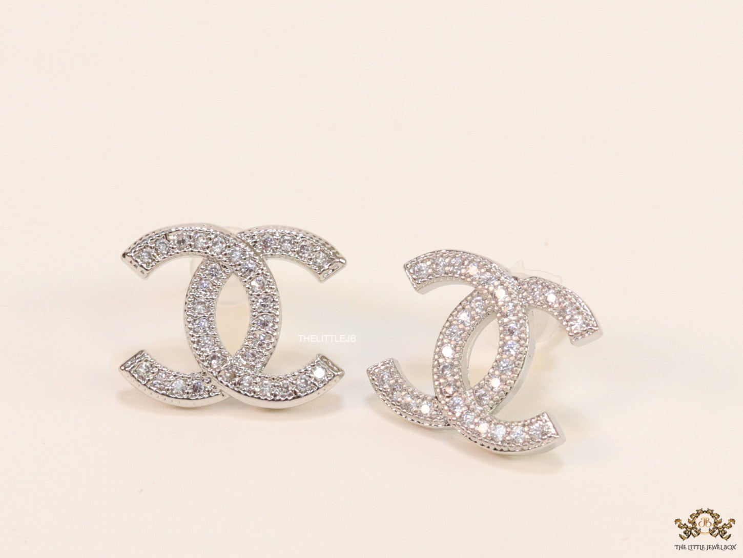 Platinum plated twin C motif cz studs