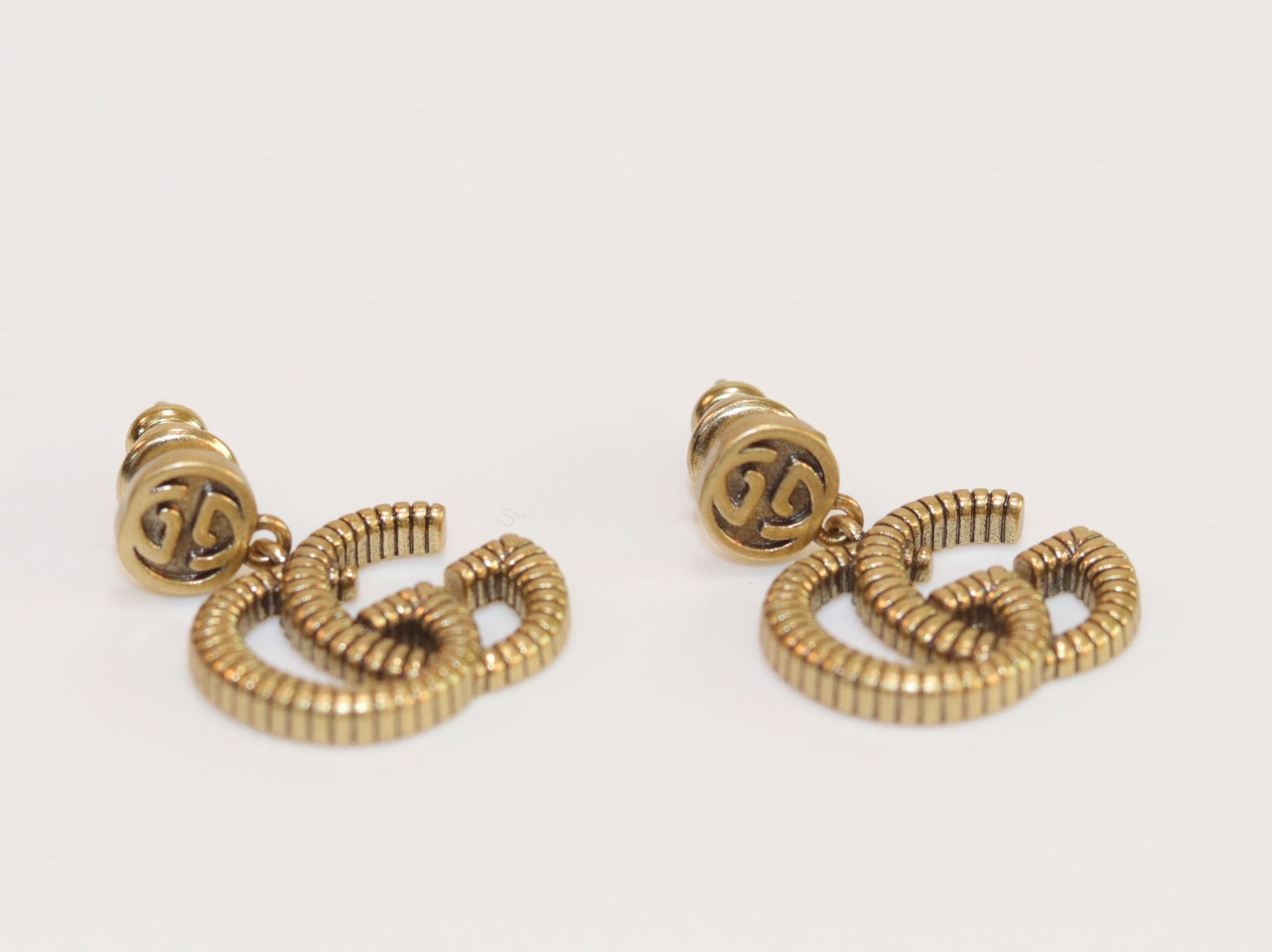 Double G rustic gold stud dangles