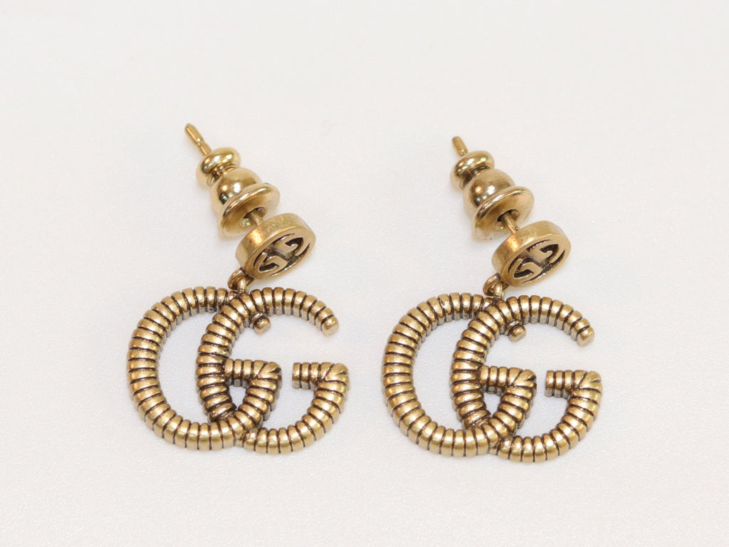Double G rustic gold stud dangles