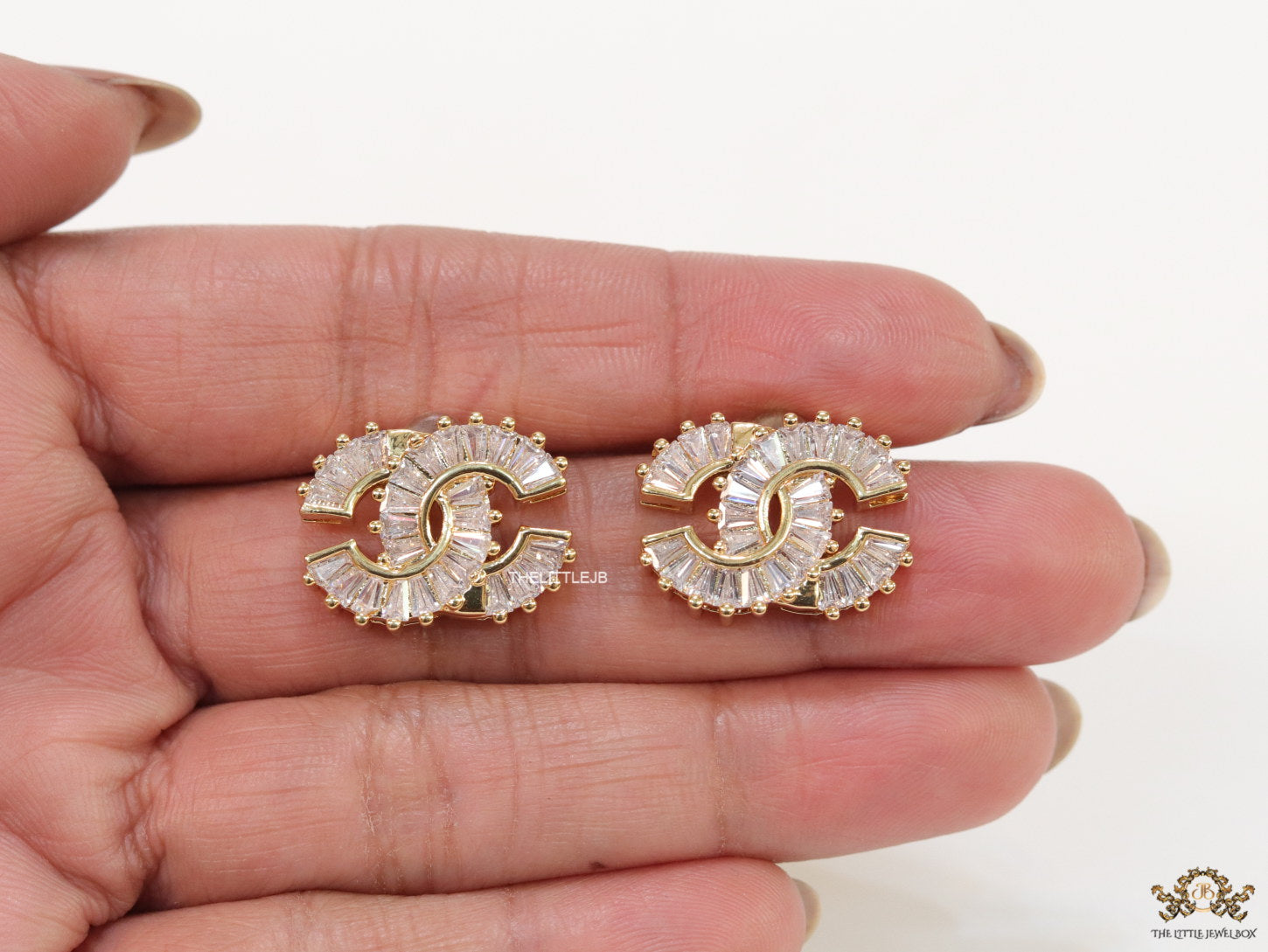 Gold plated twin C motif cz baguette studs