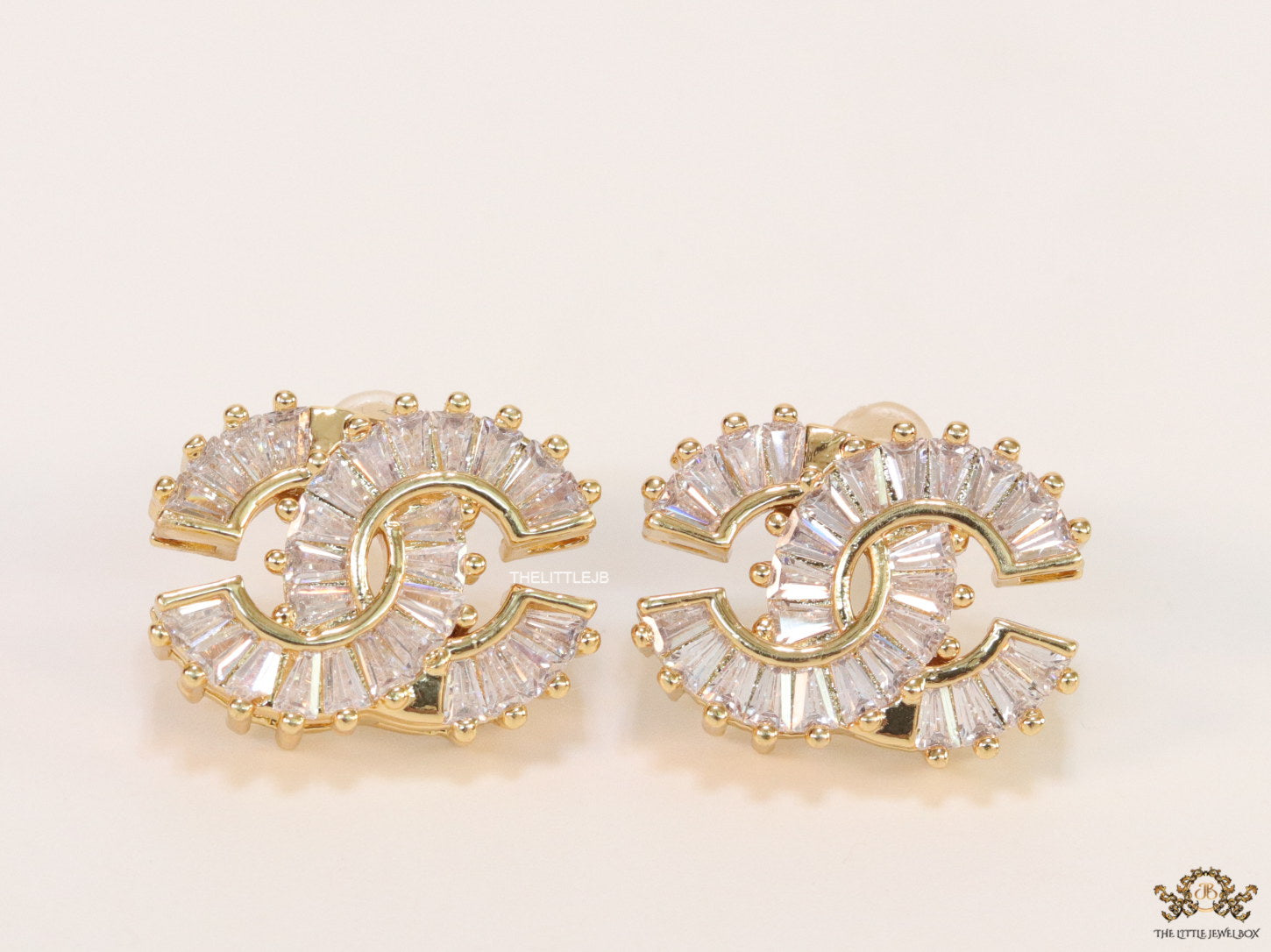 Gold plated twin C motif cz baguette studs