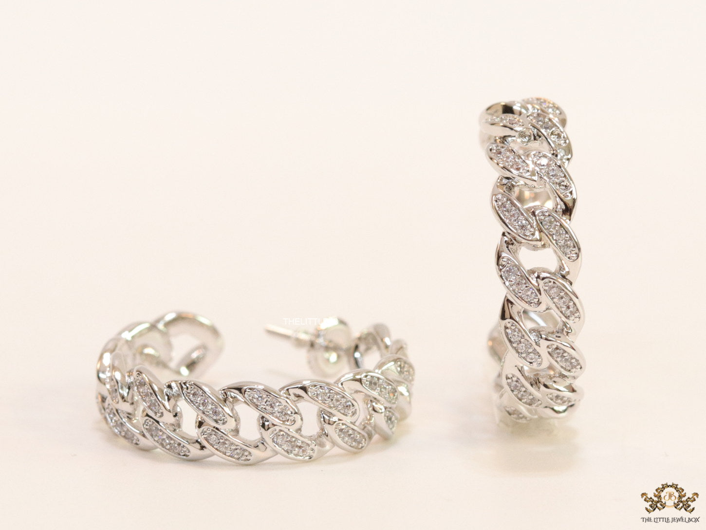 Platinum plated open cz hoops in link chain pattern