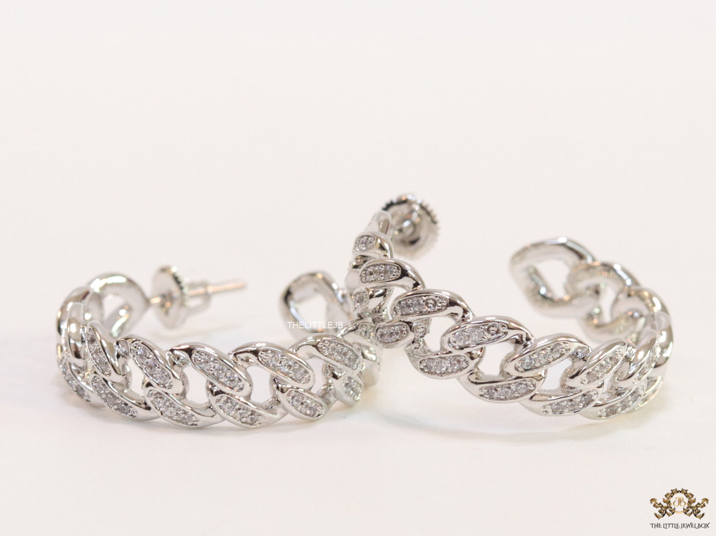 Platinum plated open cz hoops in link chain pattern