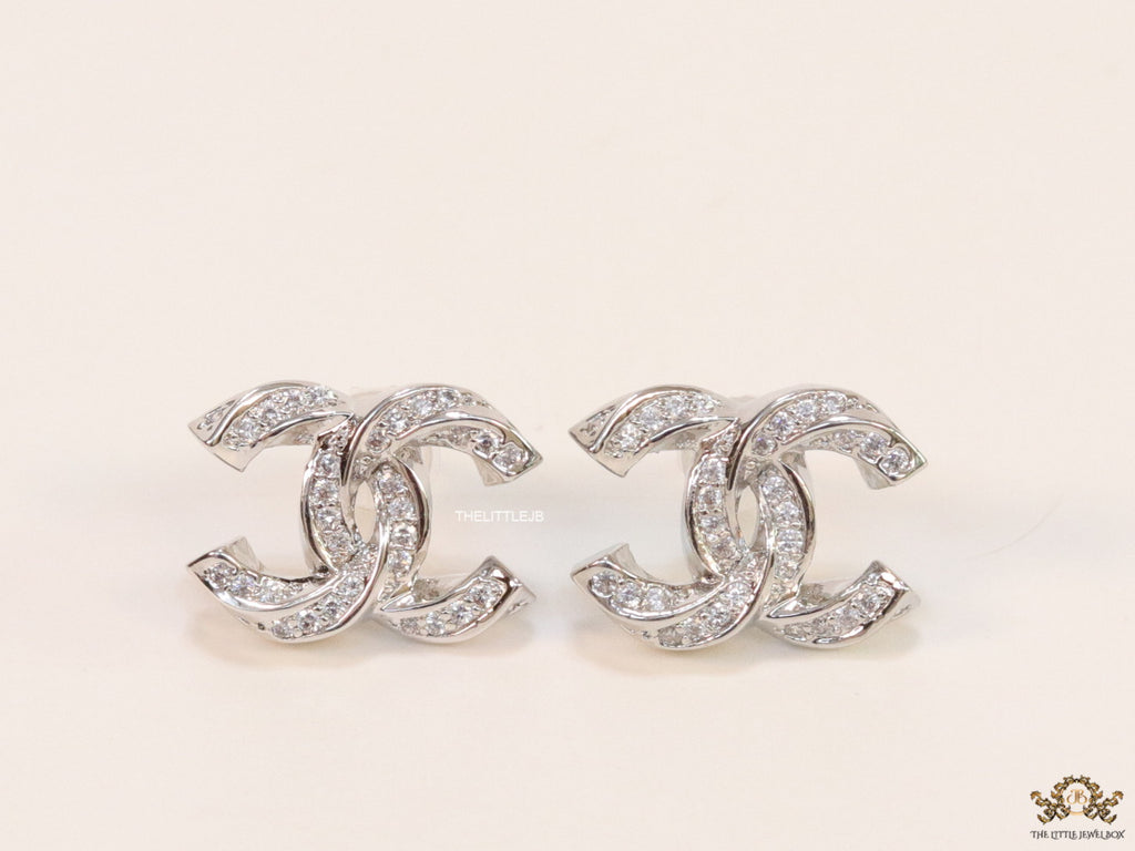 Platinum plated entwined twin C motif cz studs