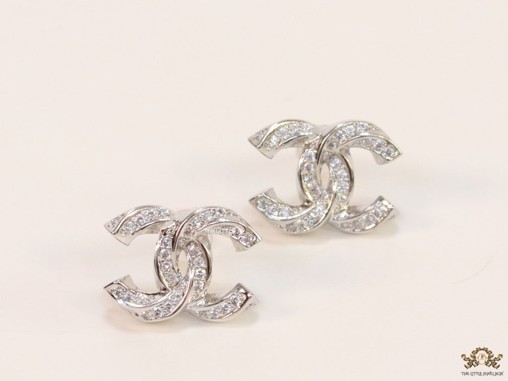 Platinum plated entwined twin C motif cz studs