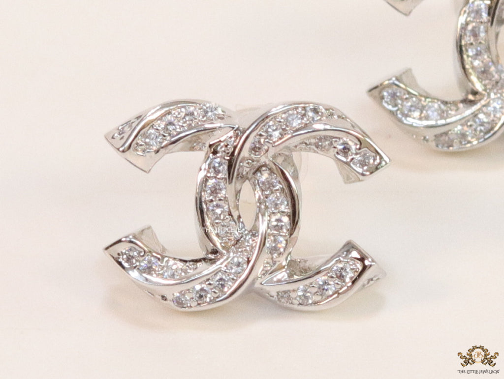 Platinum plated entwined twin C motif cz studs