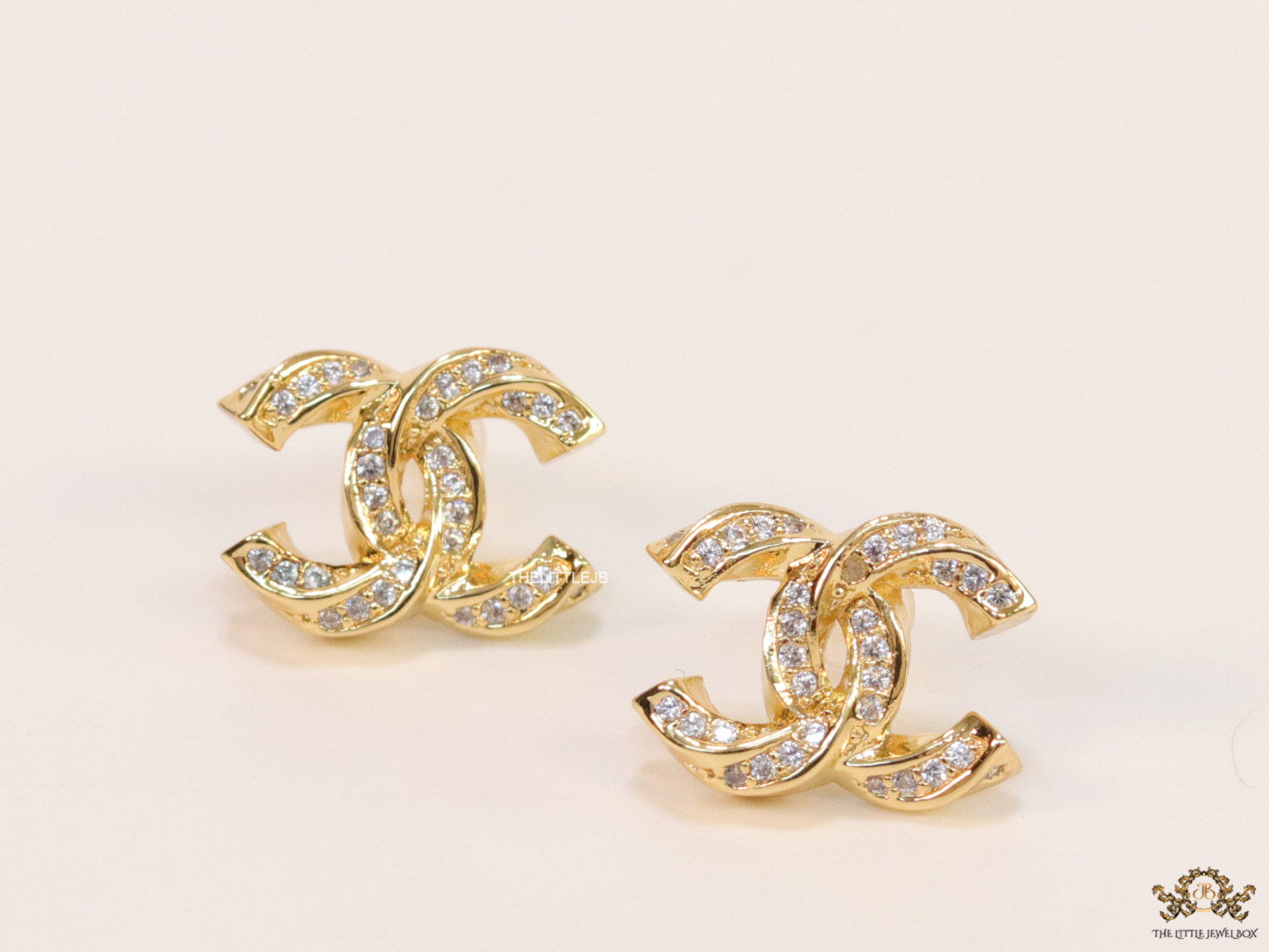 Gold plated entwined twin C motif cz studs