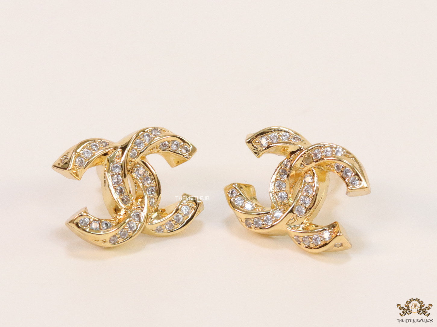 Gold plated entwined twin C motif cz studs