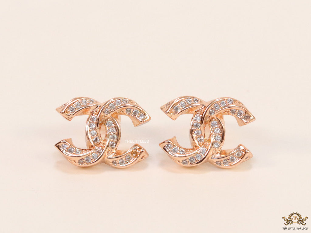 Rose gold plated entwined twin C motif cz studs