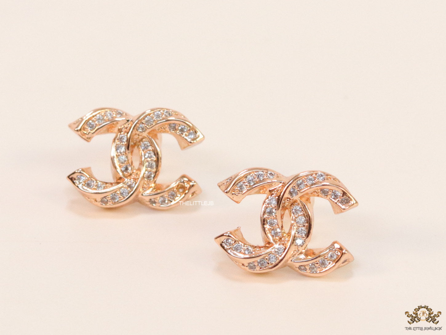 Rose gold plated entwined twin C motif cz studs