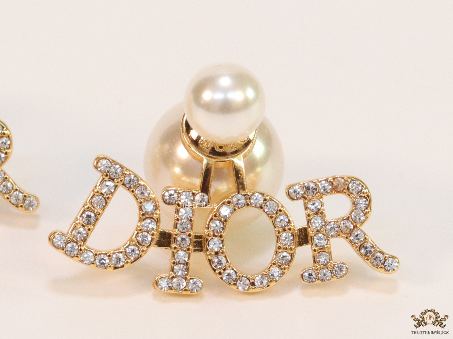 Gold plated alphabet studs in cz and pearl
