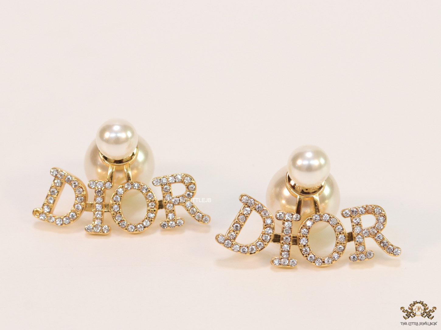 Gold plated alphabet studs in cz and pearl