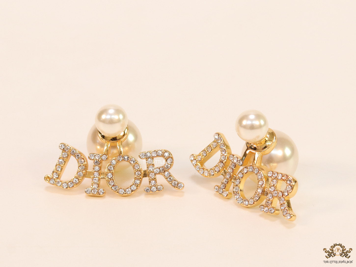 Gold plated alphabet studs in cz and pearl