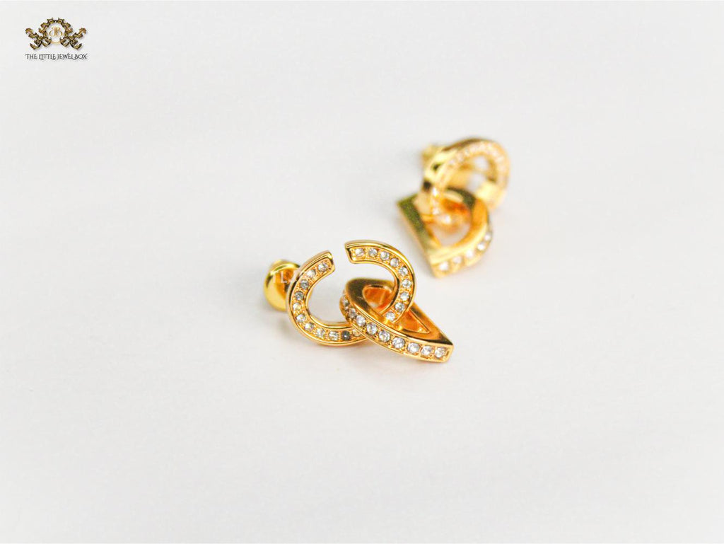 Alphabet D drop earrings in gold