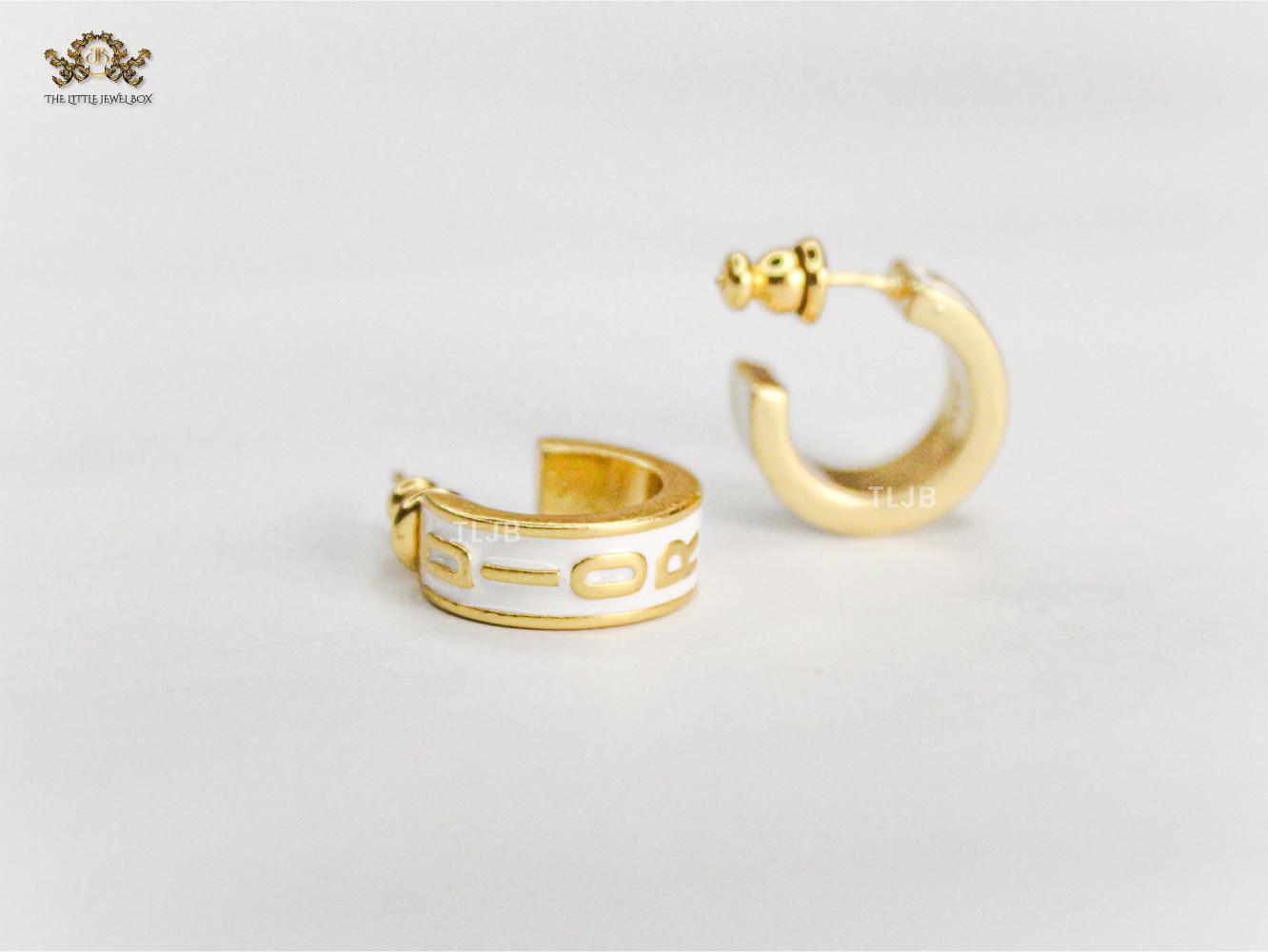 Alphabet D white hoops with gold detailing