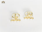 Alphabet C & D gold toned studs with pearl charms