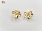 Alphabet D  mini charmed earrings in gold