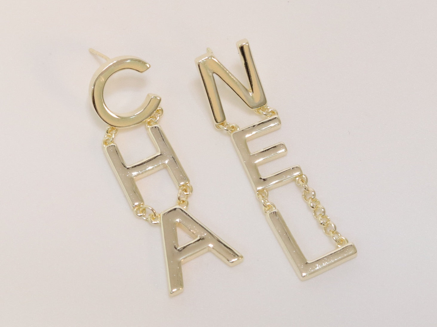 Double C long gold dangles