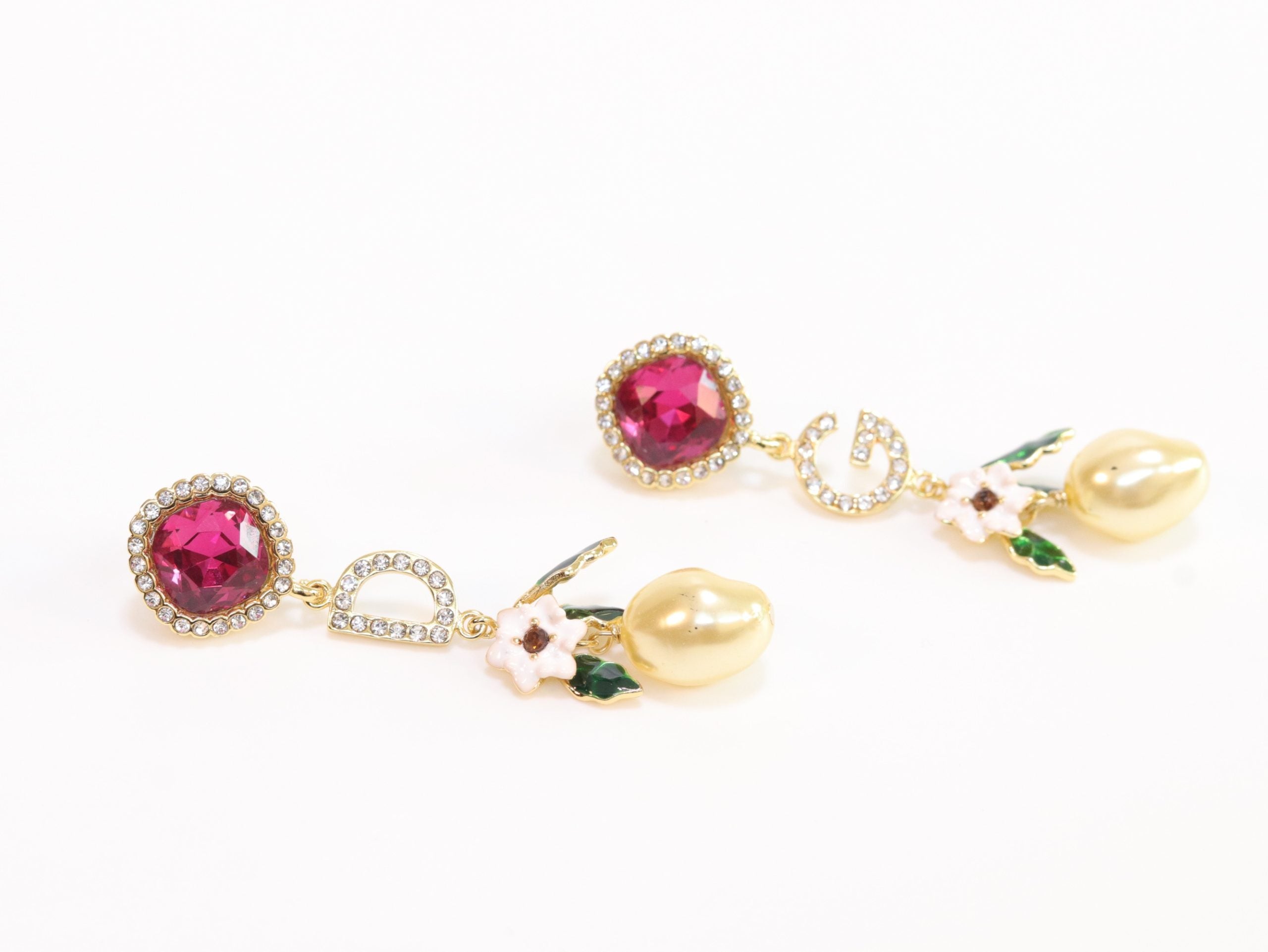 Alphabet D and G multicoloured long dangles in gold finish with cz