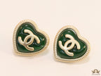 Heart shape twin C motif golden studs with deep green base