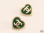 Heart shape twin C motif golden studs with deep green base