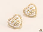 Heart shape twin C motif golden studs with pearl base