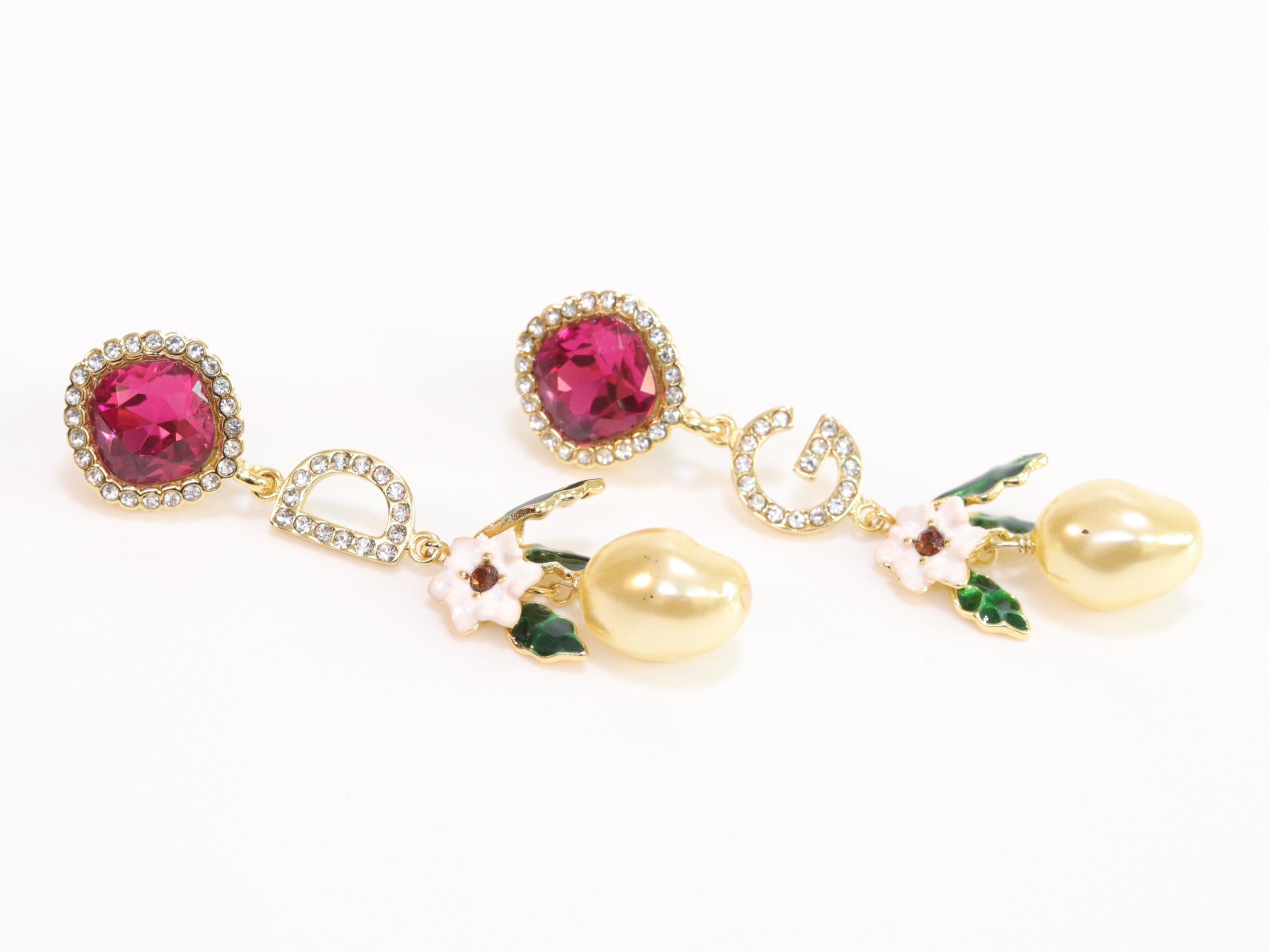 Alphabet D and G multicoloured long dangles in gold finish with cz