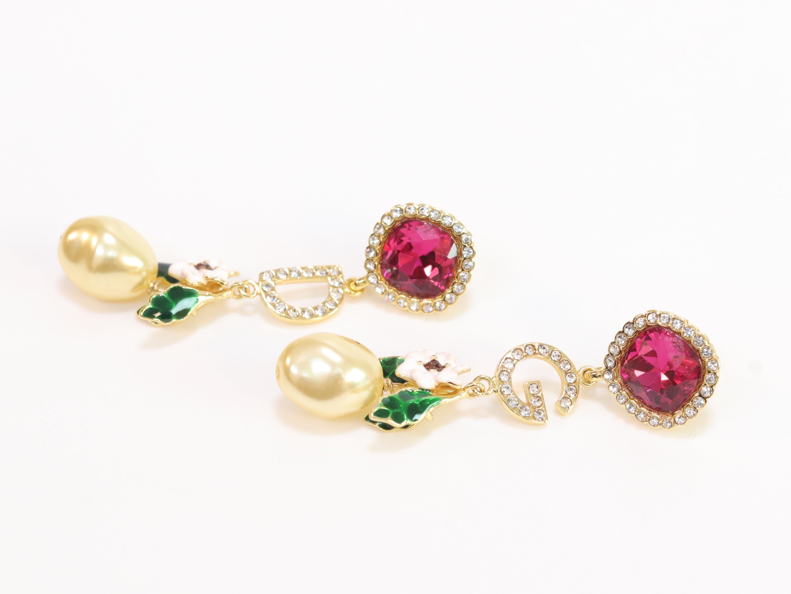 Alphabet D and G multicoloured long dangles in gold finish with cz