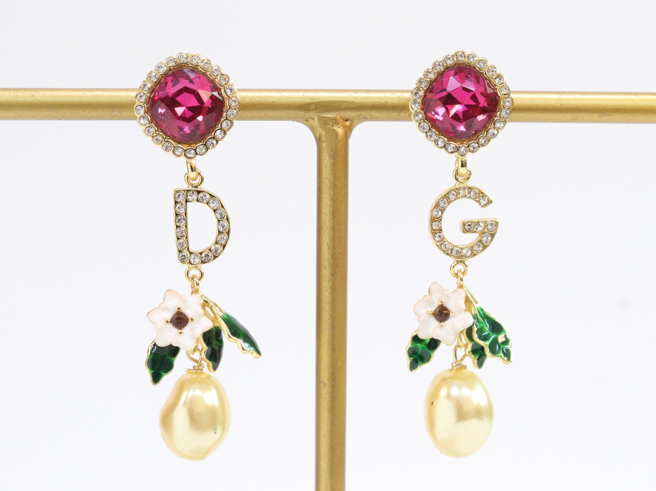 Alphabet D and G multicoloured long dangles in gold finish with cz