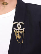 Double C gold and cz brooch with chains