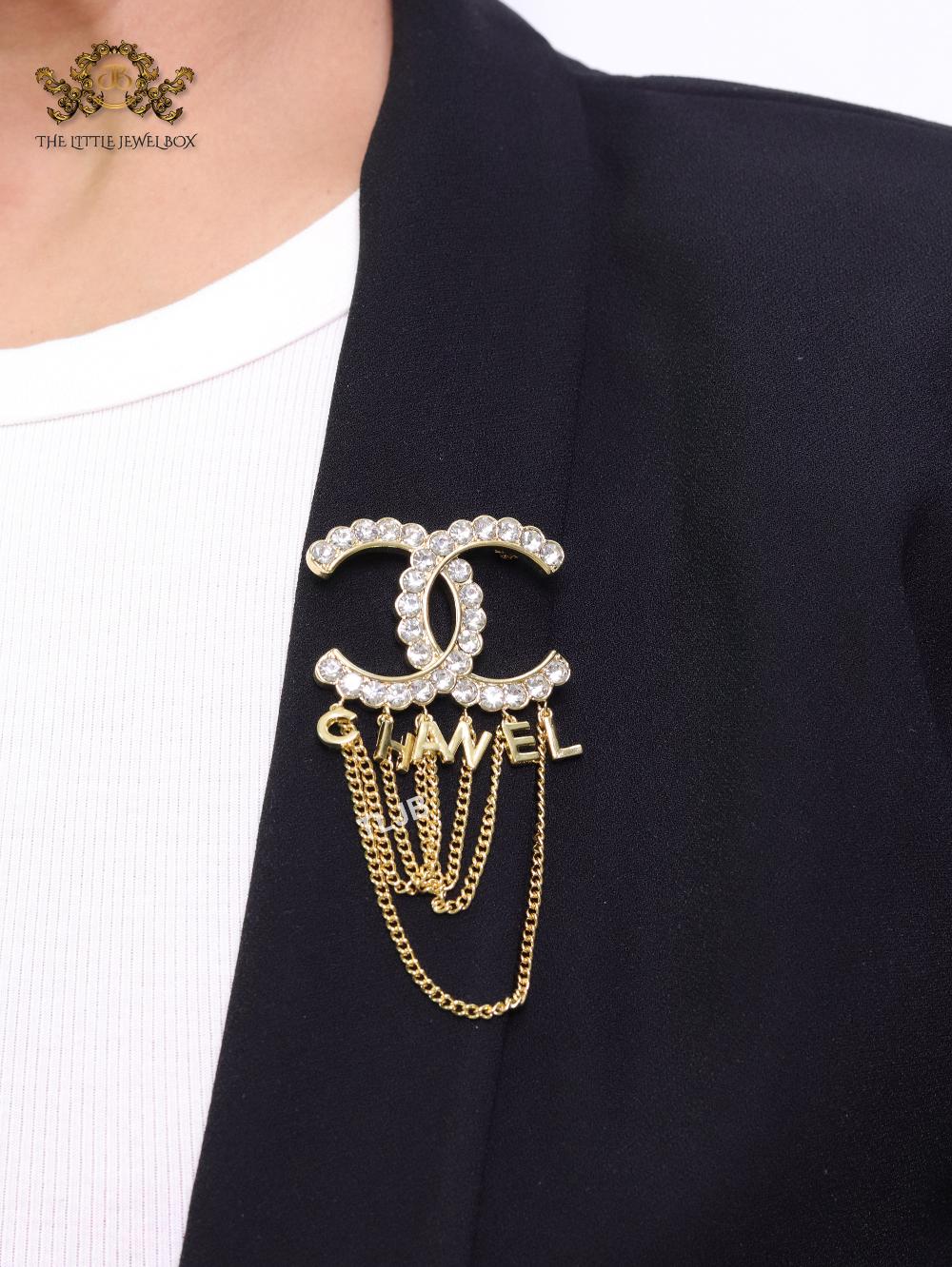 Double C gold and cz brooch with chains