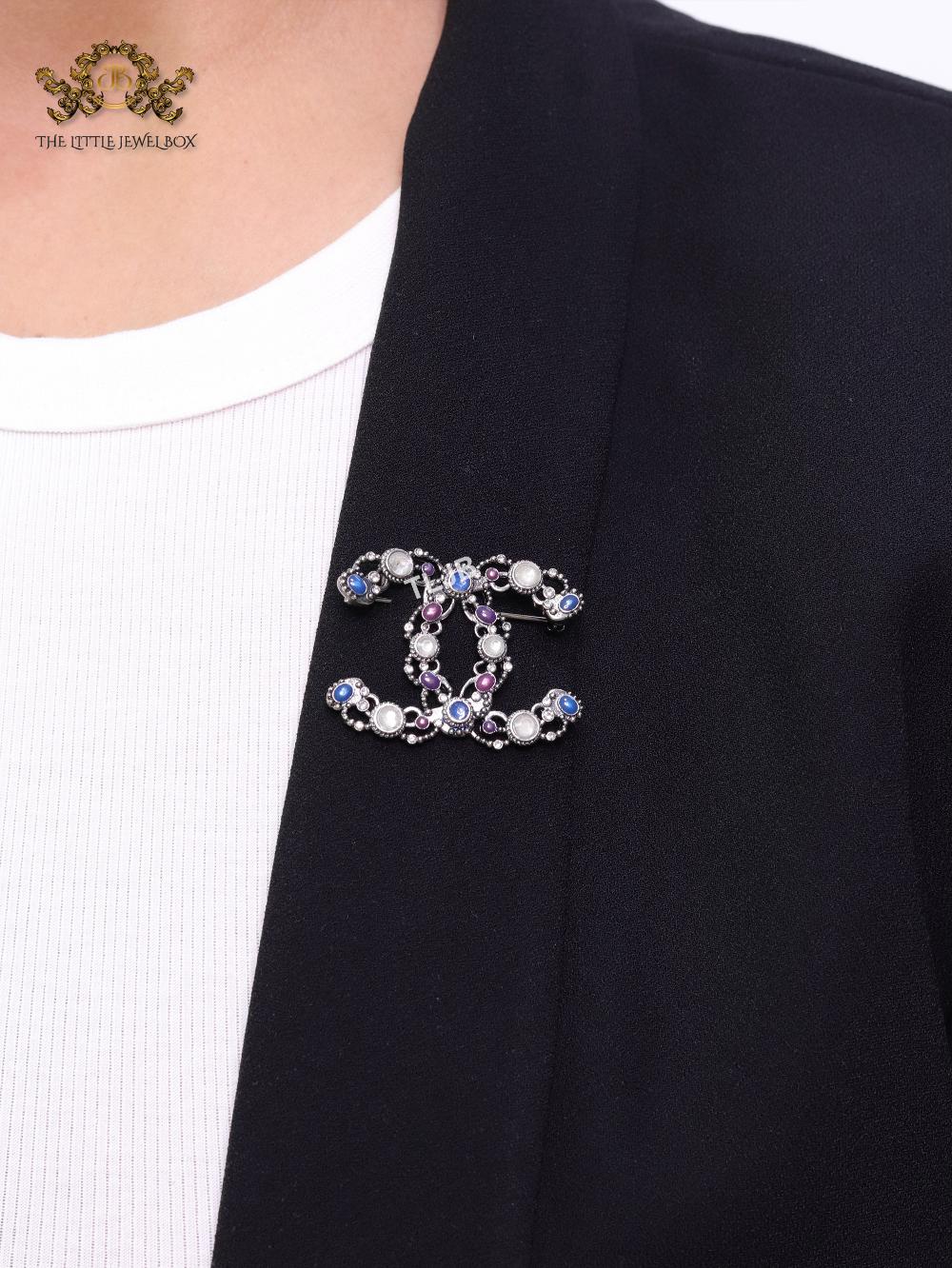 Antique platinum finish double C brooch with multi coloured stones