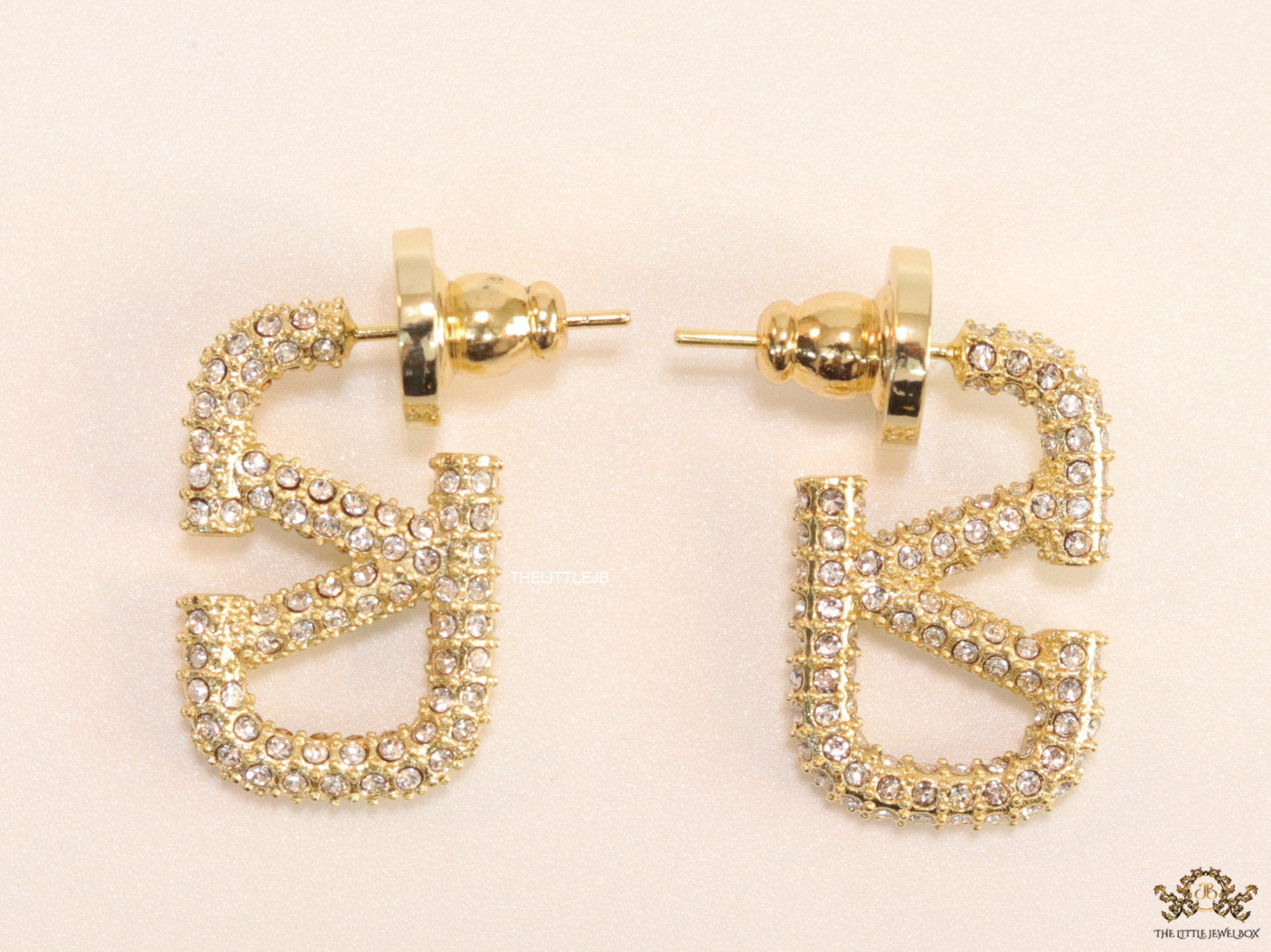 Golden cz alphabet studs with letter V