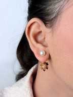 Floral CD rose gold bomber studs