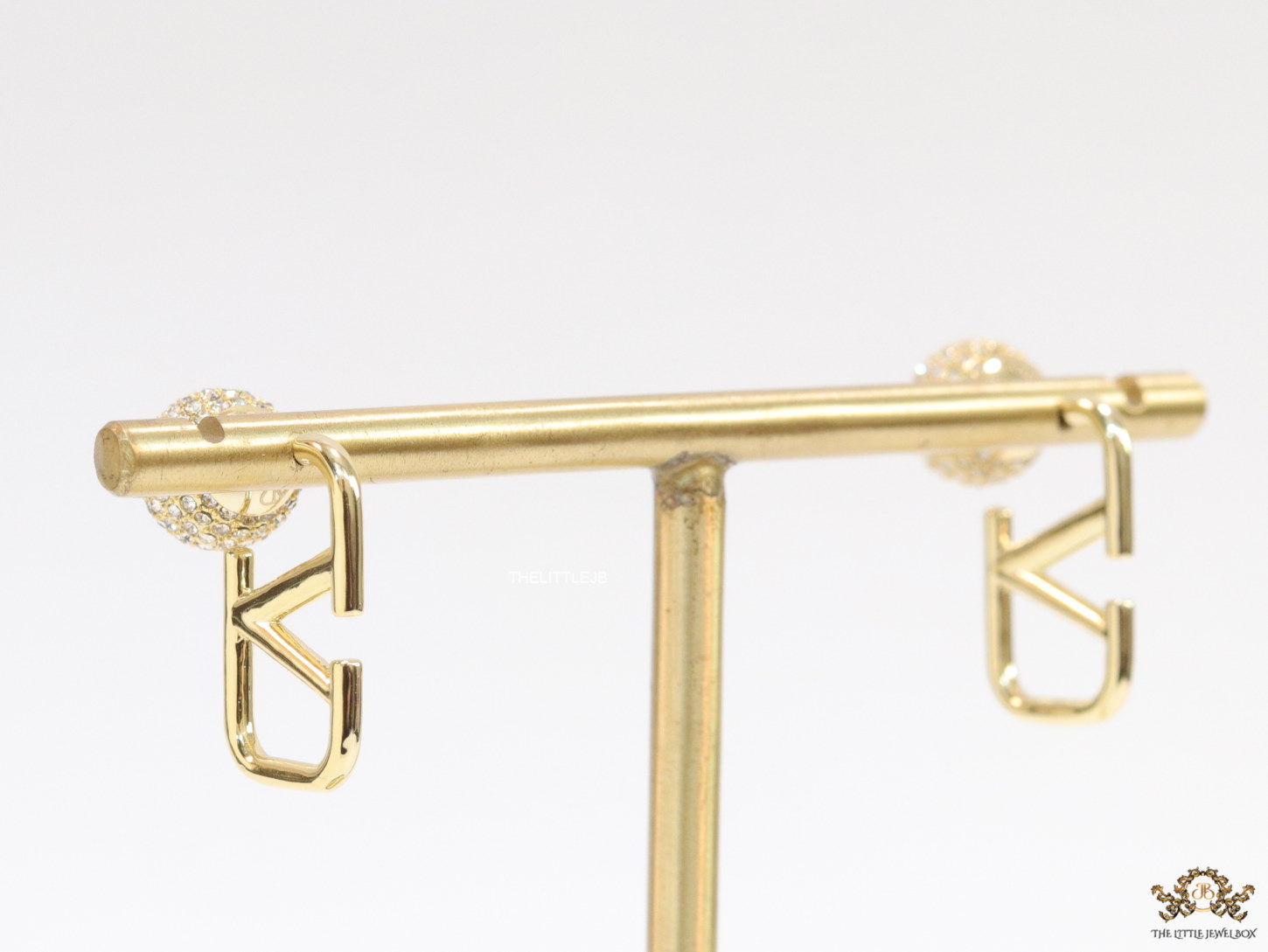 Golden alphabet V studs with cz ball