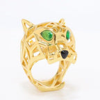 Gold plated 3D panther head ring with cz and emerald green eyes