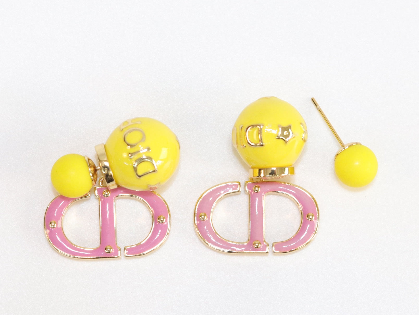 Pink and Yellow alphabet CD stud in gold finish