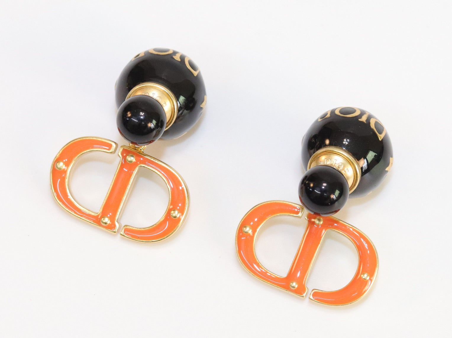Black and Orange alphabet C and D stud in gold finish