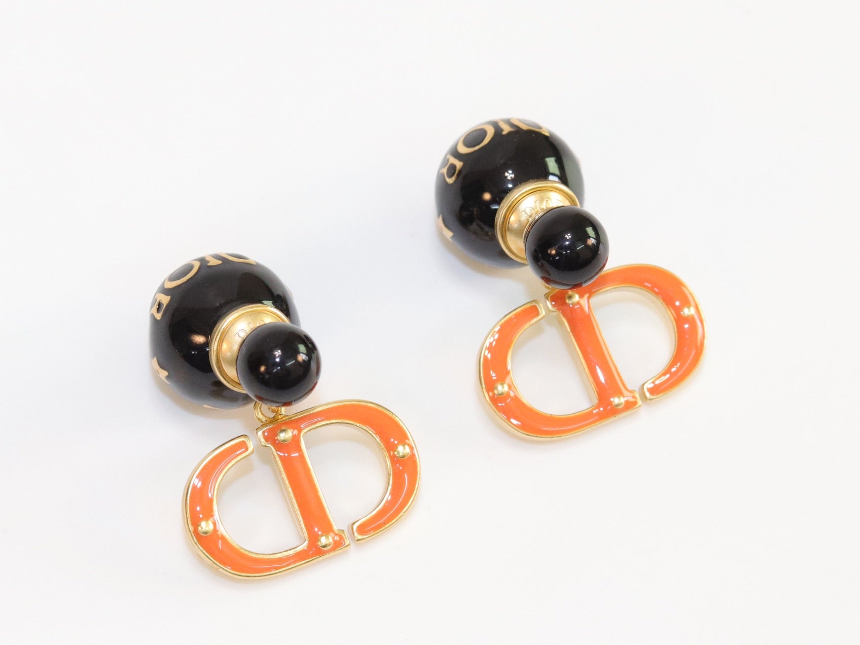 Black and Orange alphabet C and D stud in gold finish